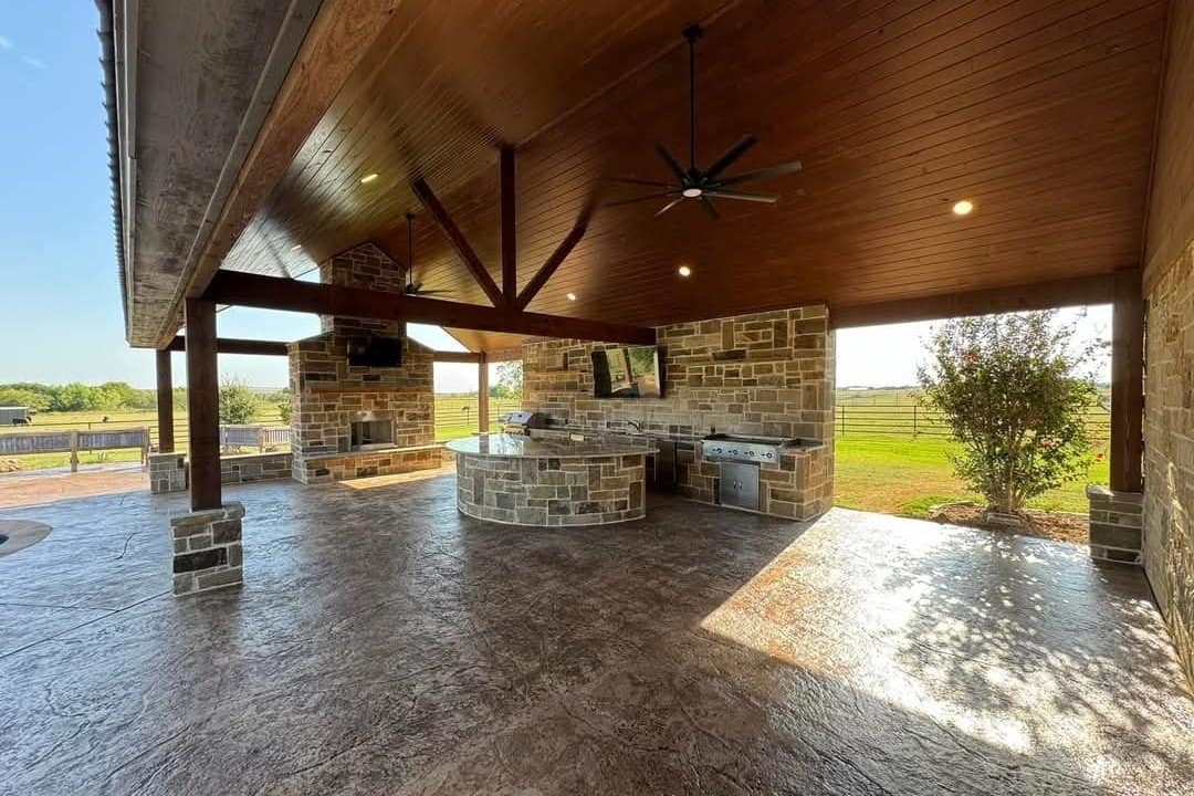 covered pavilion stone outdoor kitchen timber truss